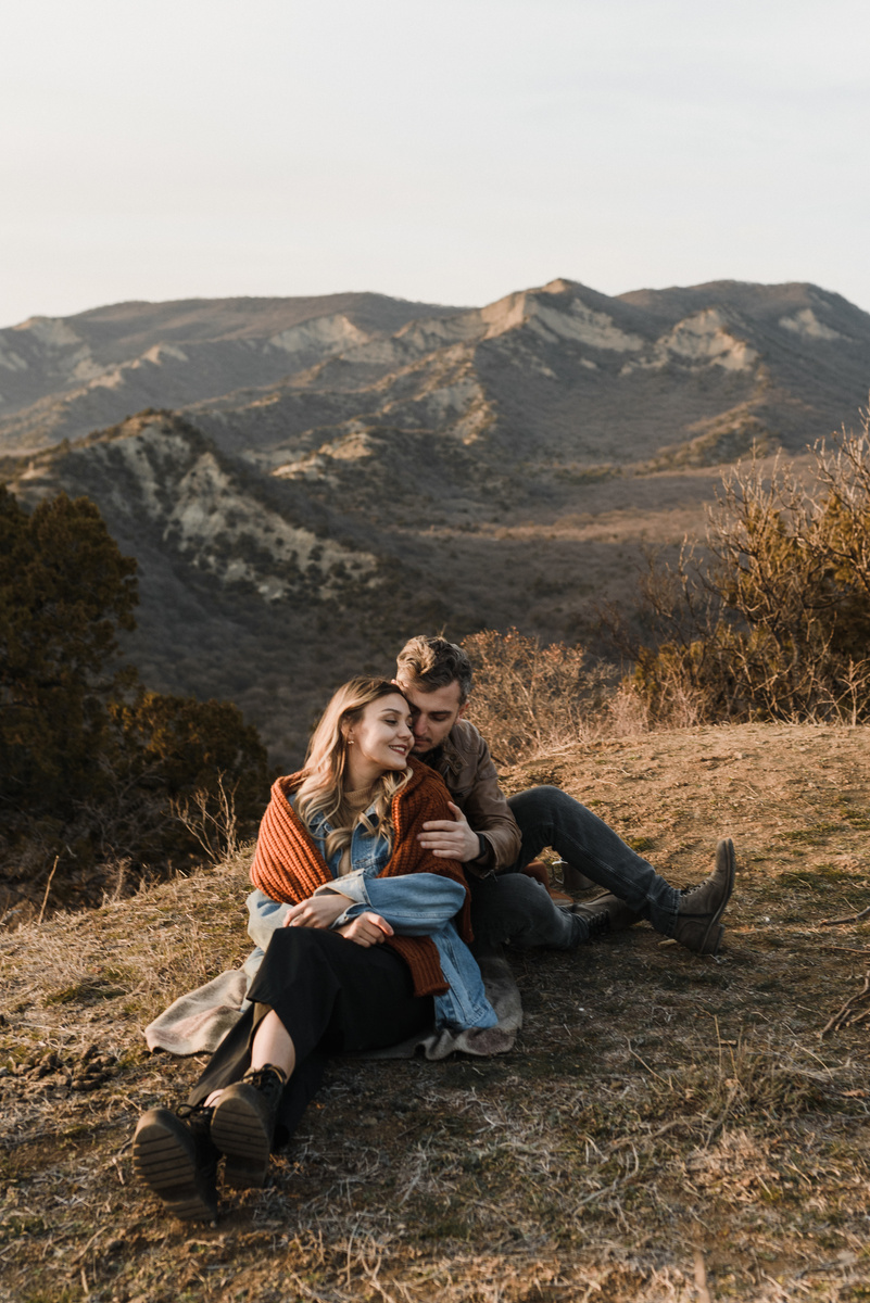 Couple Sitting on the Ground